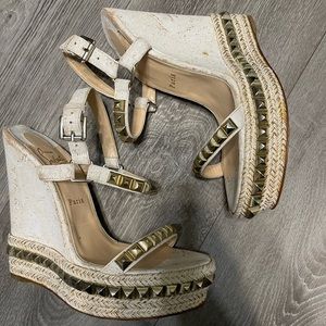 CHRISTIAN LOUBOUTIN
Pyraclou leather wedge sandals